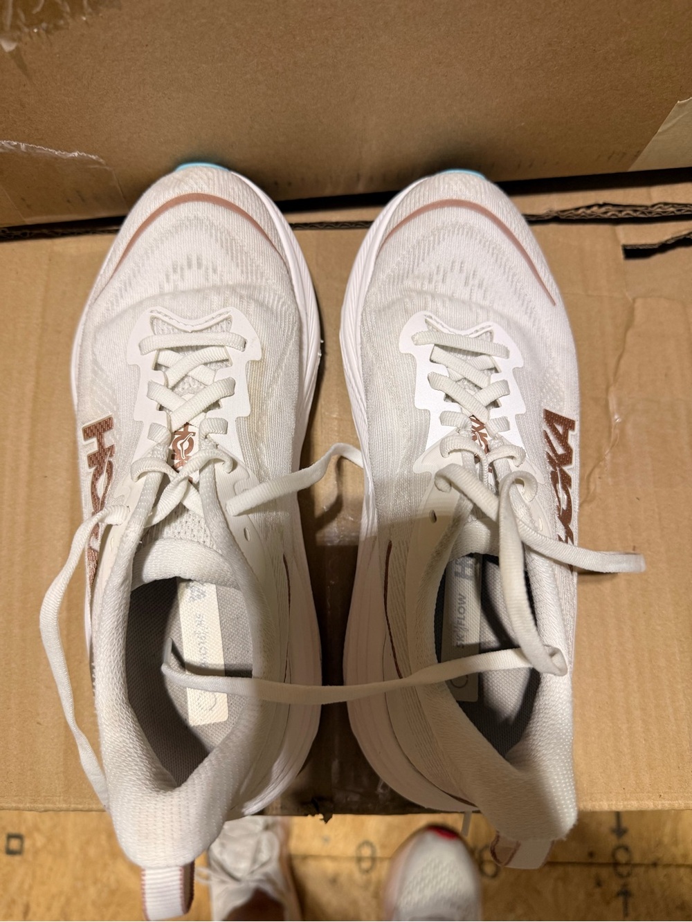 Hoka Women's White Running Shoes with Rose Gold Logo